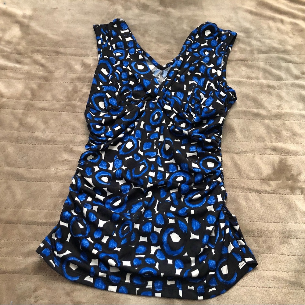 Sleeveless blue, black and white INC blouse. Size small.